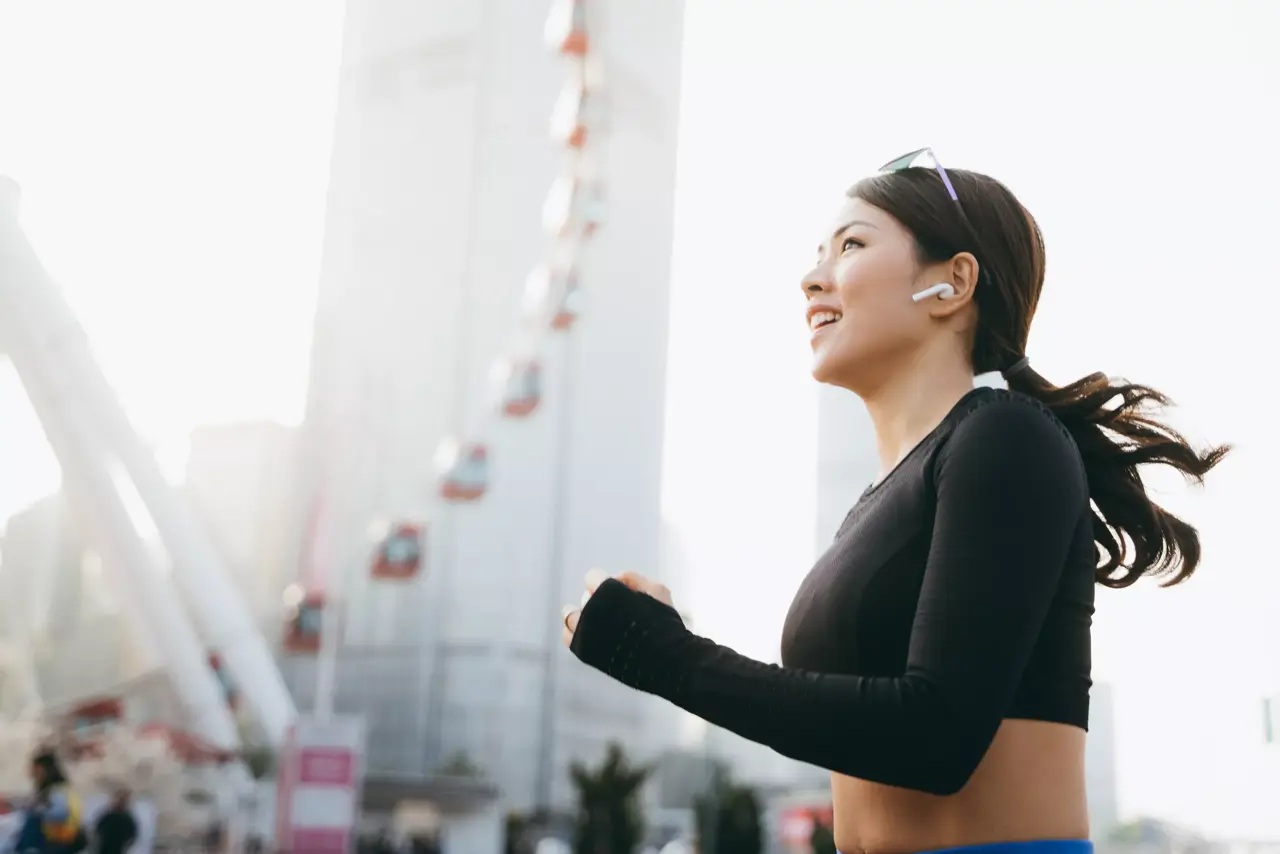 woman-running-with-in-ear-headphones.jpg