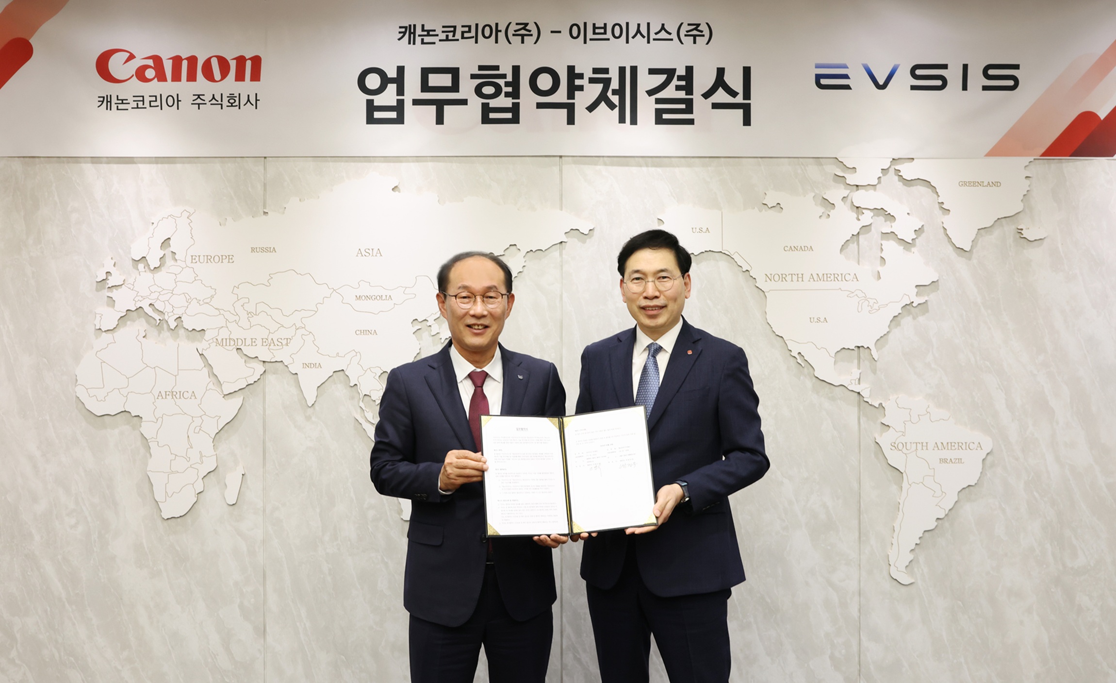 캐논코리아-이브이시스, 전기차 충전 인프라 구축 MOU 체결 (좌) 박정우 캐논코리아 대표, (우) 오영식 이브이시스 대표.JPG