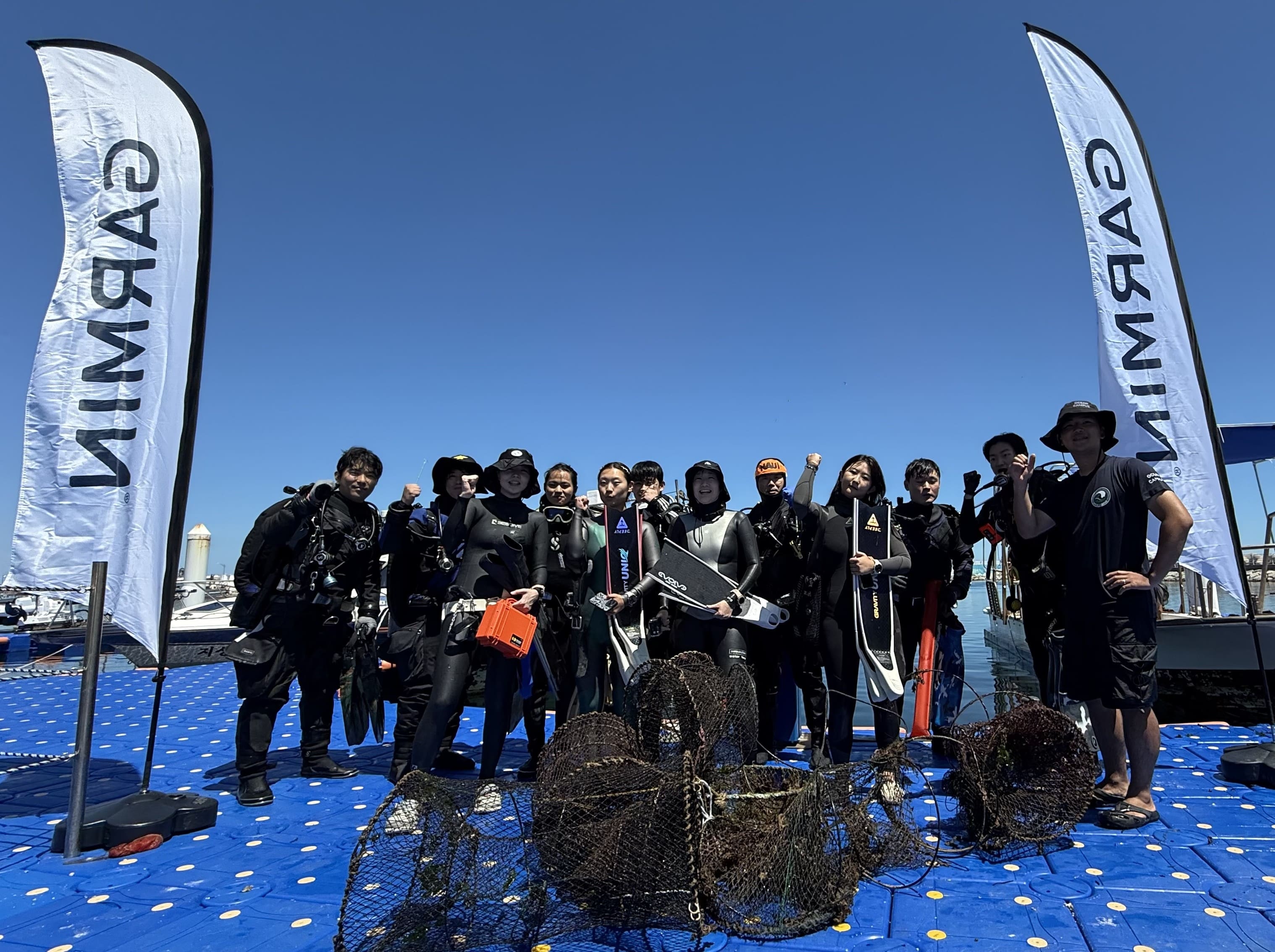 가민, 오션캠퍼스와 함께 포항 방석리 해안서 바다 정화 활동 성료.jpg